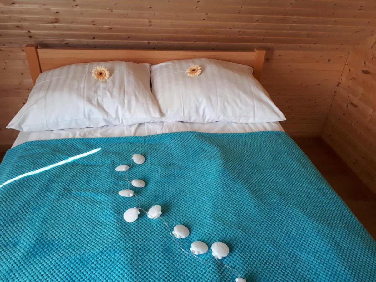 Domki Letniskowe Turkus Rewal Esterno foto